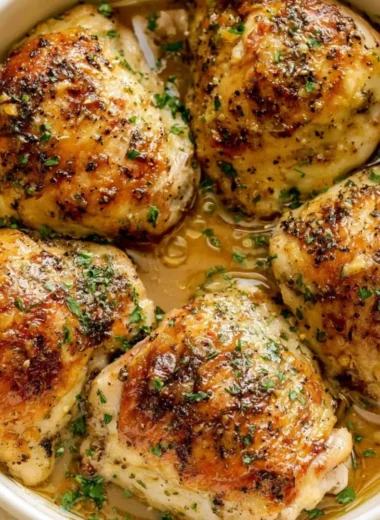 Oven baked chicken thighs with honey mustard glaze, golden and crispy skin.